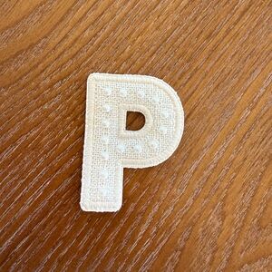 Pearl K letter patch